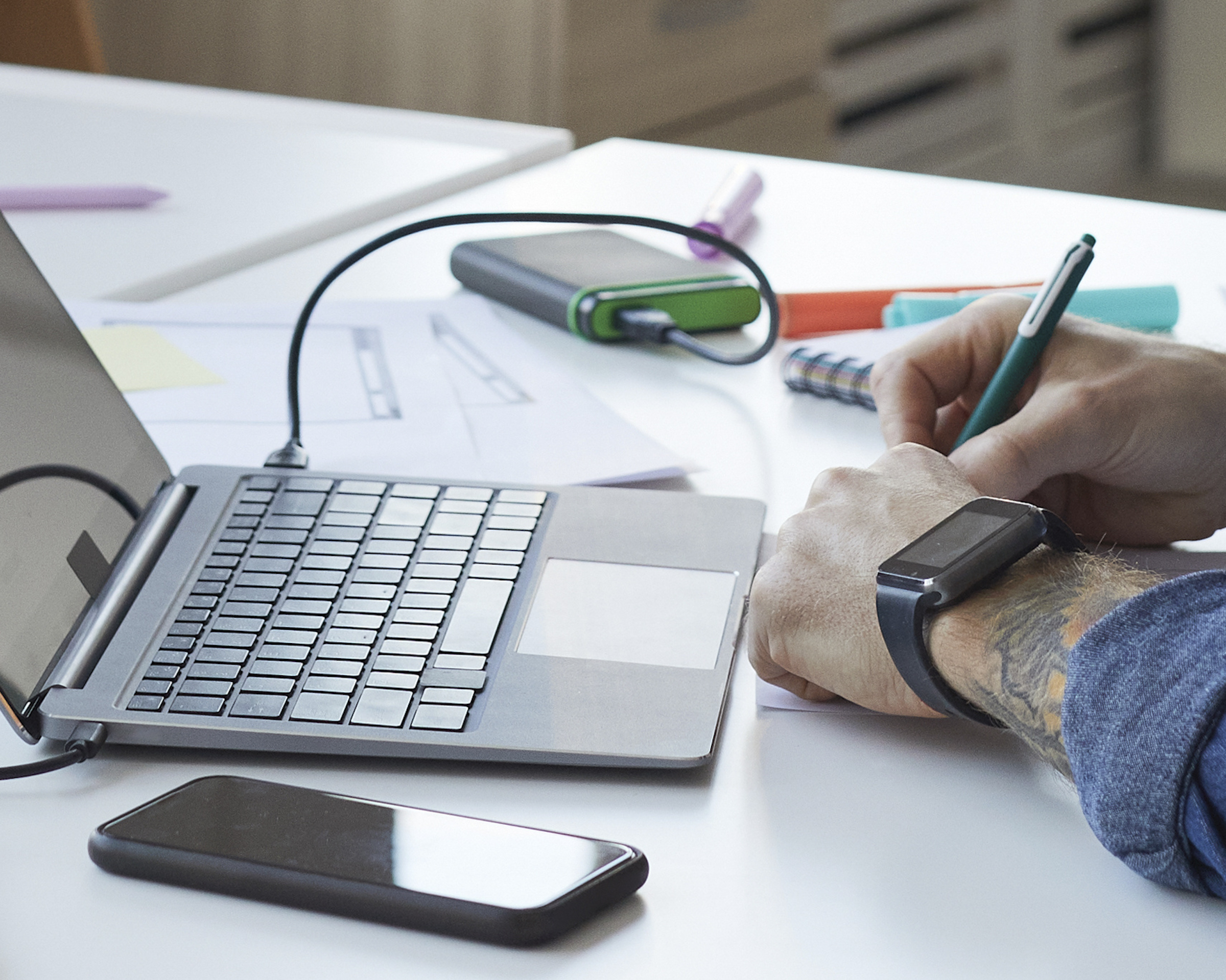 A man looks for a registered agent online. The RA acts as a liaison between the company and the Illinois secretary of state