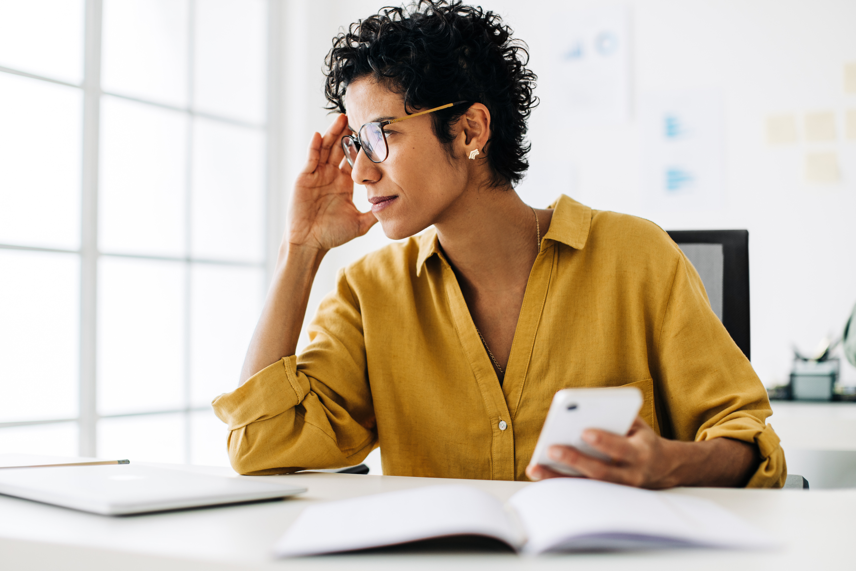 Businesses can trademark their names nationwide if they register the name with the U.S. Patent and Trademark Office (USPTO). This woman waits for notification from the USPTO.